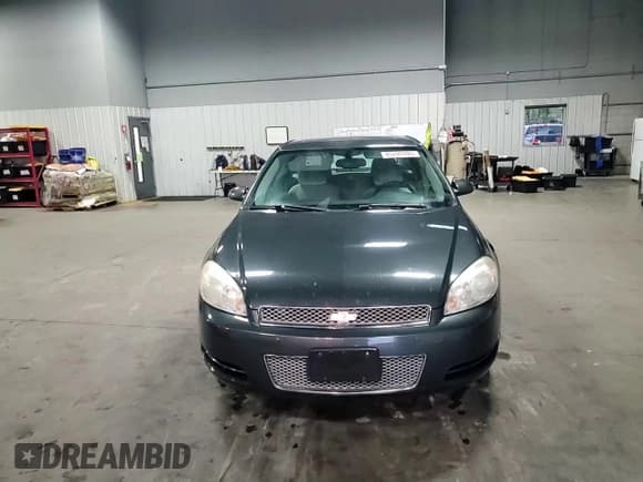 ✅ 2014 Chevrolet Impala LT • VIN: 2G1WB5E35E1112642 • Lot: 85209705. Listed on Copart with 161,688 mi. Free auction sales archive from the USA and detailed vehicle history report at DreamBid. Image 13.