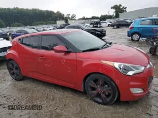 ✅ 2013 Hyundai Veloster w/Gray Int • VIN: KMHTC6AD1DU122269 • Lot: 66020854. Wystawiony na Copart z przebiegiem 82 607 mil. Bezpłatny archiwum sprzedaży aukcyjnych z USA i szczegółowy raport historii pojazdu na DreamBid. Zdjęcie 4.