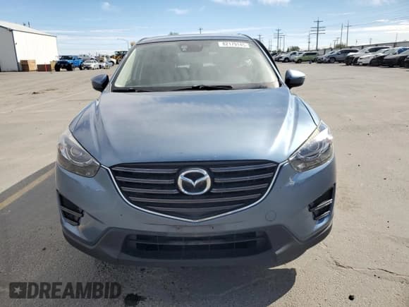 ✅ 2016 Mazda CX-5 Grand Touring • VIN: JM3KE4DY9G0612426 • Lot: 82179145. Wystawiony na Copart z przebiegiem 147 130 mil. Bezpłatny archiwum sprzedaży aukcyjnych z USA i szczegółowy raport historii pojazdu na DreamBid. Zdjęcie 5.