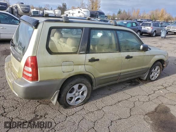 ✅ 2004 Subaru Forester XS • VIN: JF1SG65684H742261 • Lot: 94177745. Listed on Copart with 164,692 mi. Free auction sales archive from the USA and detailed vehicle history report at DreamBid. Image 3.