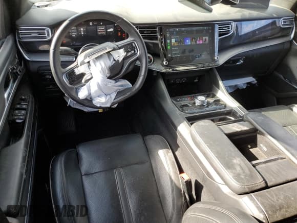 ✅ 2022 Jeep Grand Wagoneer Series II • VIN: 1C4SJVFP6NS167093 • Lot: 69591494. Listed on Copart with 31,930 mi. Free auction sales archive from the USA and detailed vehicle history report at DreamBid. Image 8.