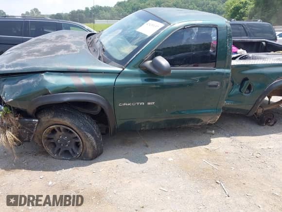 2001 Dodge Dakota Sport z VIN 1B7GG26N11S149189, wystawiony jako IAAI lot #42435137 z przebiegiem 152 363 mil mil oraz . Historia ofert i sprzedaży dostępna na DreamBid. Obrazek 6.