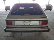 ✅ 1990 Plymouth Horizon • VIN: 1P3XL18D3LC706868 • Lot: 84697704. Wystawiony na Copart z przebiegiem 98 633 mil. Bezpłatny archiwum sprzedaży aukcyjnych z USA i szczegółowy raport historii pojazdu na DreamBid. Zdjęcie 6.