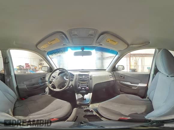 2007 Hyundai Tucson GLS z VIN KM8JM12B47U525445, wystawiony jako Copart lot #83848614 z przebiegiem Nie podano mil oraz Szkoda całkowita • Salvage title. Historia ofert i sprzedaży dostępna na DreamBid. Obrazek 14.