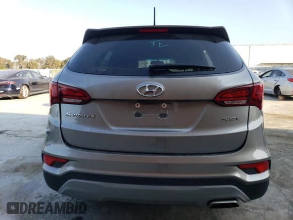 ✅ 2018 Hyundai Santa Fe 2.4L • VIN: 5NMZT3LB6JH095209 • Лот: 66211623. Опубликован ранее на Copart с пробегом 57 947 миль. Бесплатный доступ к архиву аукционных продаж из США и подробный отчёт об истории автомобиля на DreamBid. Изображение 6.