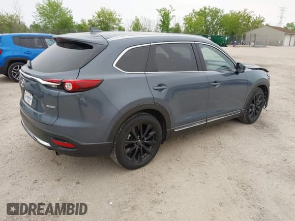 ✅ 2023 Mazda CX-9 Grand Touring • VIN: JM3TCBDY2P0636226 • Lot: 42384360. Listed on IAAI with 161,352 mi. Free auction sales archive from the USA and detailed vehicle history report at DreamBid. Image 4.