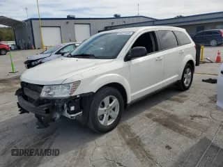 2013 Dodge Journey American Value with VIN 3C4PDCAB0DT575812, listed as a Copart auction lot 86771425 with 113,450 mi miles and Salvage title. Bid and sale history available at DreamBid. Image 1.