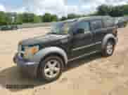 2007 Dodge Nitro SXT with VIN 1D8GT28K87W689785, listed as a Copart auction lot 57440304 with 171,738 mi miles and Salvage title. Bid and sale history available at DreamBid. Image 1.