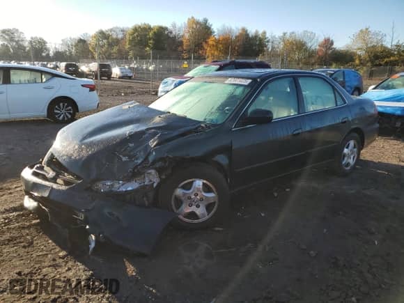 1999 Honda Accord EX with VIN 1HGCG1657XA026344, listed as a Copart auction lot 82601025 with Not provided miles and Salvage title. Bid and sale history available at DreamBid. Image 1.