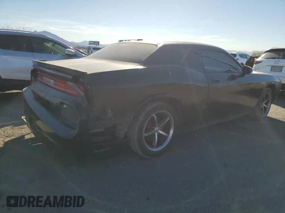 ✅ 2010 Dodge Challenger SE • VIN: 2B3CJ4DV1AH103496 • Lot: 87010934. Wystawiony na Copart z przebiegiem 190 016 mil. Bezpłatny archiwum sprzedaży aukcyjnych z USA i szczegółowy raport historii pojazdu na DreamBid. Zdjęcie 3.