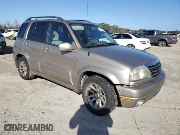 ✅ 2005 Suzuki Grand Vitara • VIN: JS3TE62V554201663 • Lot: 41711515. Wystawiony na Copart z przebiegiem Nie podano. Bezpłatny archiwum sprzedaży aukcyjnych z USA i szczegółowy raport historii pojazdu na DreamBid. Zdjęcie 4.
