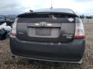 ✅ 2007 Toyota Prius • VIN: JTDKB20U873260575 • Лот: 93319765. Опубликован ранее на Copart с пробегом 288 432 миль. Бесплатный доступ к архиву аукционных продаж из США и подробный отчёт об истории автомобиля на DreamBid. Изображение 6.