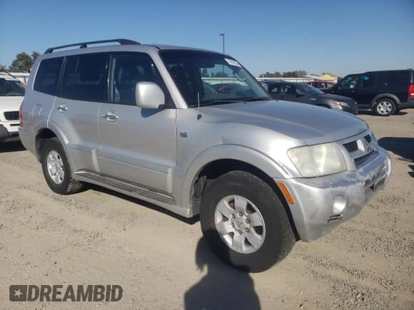 ✅ 2003 Mitsubishi Montero Limited • VIN: JA4NW51S13J030523 • Lot: 75870834. Listed on Copart with 123,320 mi. Free auction sales archive from the USA and detailed vehicle history report at DreamBid. Image 4.