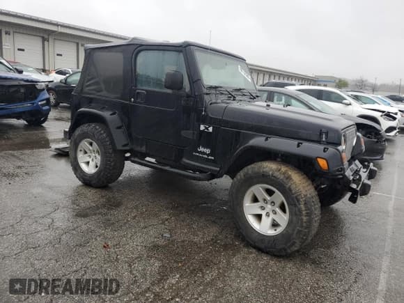 ✅ 2003 Jeep Wrangler X • VIN: 1J4FA39S63P320572 • Lot: 90732505. Listed on Copart with 121,864 mi. Free auction sales archive from the USA and detailed vehicle history report at DreamBid. Image 4.
