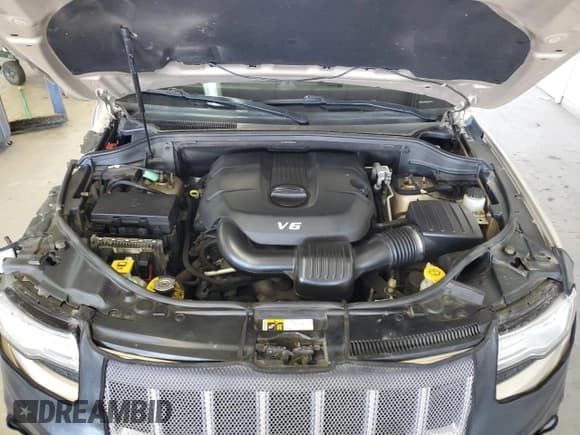 ✅ 2015 Jeep Grand Cherokee Overland • VIN: 1C4RJFCG7FC673181 • Lot: 46527875. Listed on Copart with 124,503 mi. Free auction sales archive from the USA and detailed vehicle history report at DreamBid. Image 14.