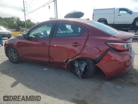 ✅ 2020 Toyota Yaris L • VIN: 3MYDLBYV5LY702301 • Лот: 70509325. Опубликован ранее на Copart с пробегом 54 342 миль. Бесплатный доступ к архиву аукционных продаж из США и подробный отчёт об истории автомобиля на DreamBid. Изображение 2.