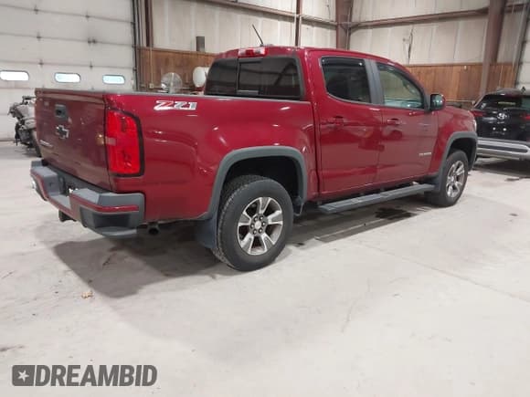 ✅ 2018 Chevrolet Colorado 4WD Z71 • VIN: 1GCGTDEN4J1185490 • Лот: 43420567. Опубликован ранее на IAAI с пробегом 80 532 миль. Бесплатный доступ к архиву аукционных продаж из США и подробный отчёт об истории автомобиля на DreamBid. Изображение 4.