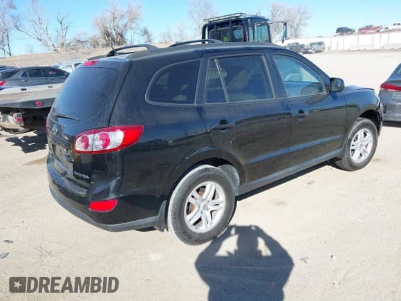 ✅ 2010 Hyundai Santa Fe GL • VIN: 5NMSG3AB6AH386284 • Lot: 41701464. Listed on IAAI with 85,861 mi. Free auction sales archive from the USA and detailed vehicle history report at DreamBid. Image 4.