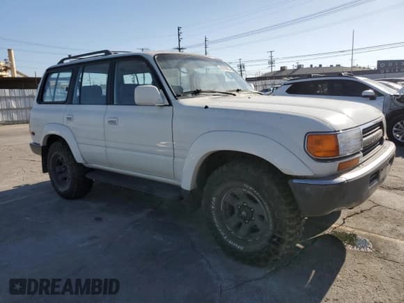 ✅ 1991 Toyota Land Cruiser • VIN: JT3FJ80W0M0022407 • Lot: 85136025. Listed on Copart with 218,871 mi. Free auction sales archive from the USA and detailed vehicle history report at DreamBid. Image 4.
