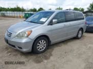 ✅ 2010 Honda Odyssey EX • VIN: 5FNRL3H49AB023447 • Lot: 42185412. Listed on IAAI with 215,317 mi. Free auction sales archive from the USA and detailed vehicle history report at DreamBid. Image 2.