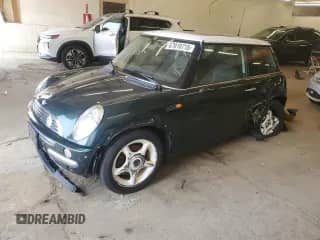 2003 MINI Hardtop with VIN WMWRC33463TE17964, listed as a Copart auction lot 67010715 with 88,753 mi miles and Salvage title. Bid and sale history available at DreamBid. Image 1.