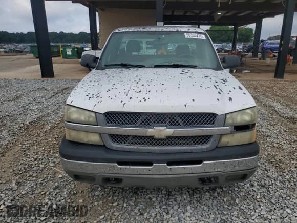 2004 Chevrolet Silverado 1500 LS z VIN 1GCEC14T04E206936, wystawiony jako Copart lot #56305735 z przebiegiem Nie podano mil oraz Szkoda całkowita • Salvage title. Historia ofert i sprzedaży dostępna na DreamBid. Obrazek 5.