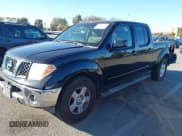 ✅ 2008 Nissan Frontier SE • VIN: 1N6AD09U78C450900 • Lot: 43885377. Listed on IAAI with 94,641 mi. Free auction sales archive from the USA and detailed vehicle history report at DreamBid. Image 2.