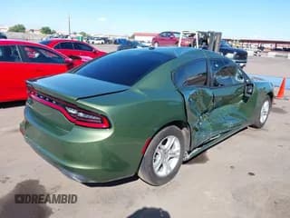 ✅ 2022 Dodge Charger SXT • VIN: 2C3CDXBG1NH138867 • Lot: 43454424. Listed on IAAI with 39,320 mi. Free auction sales archive from the USA and detailed vehicle history report at DreamBid. Image 4.