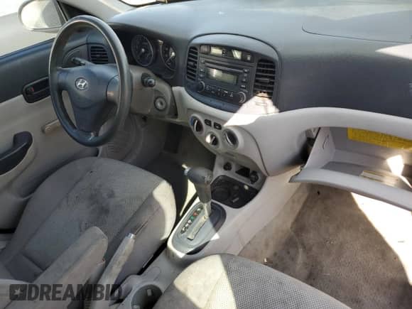 2007 Hyundai Accent GLS z VIN KMHCN46CX7U102105, wystawiony jako Copart lot #65793504 z przebiegiem 213 972 mil mil oraz Szkoda całkowita • Salvage title. Historia ofert i sprzedaży dostępna na DreamBid. Obrazek 8.