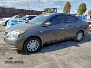 ✅ 2015 Nissan Versa S Plus • VIN: 3N1CN7AP6FL827888 • Lot: 94734925. Listed on Copart with 122,214 mi. Free auction sales archive from the USA and detailed vehicle history report at DreamBid. Image 1.