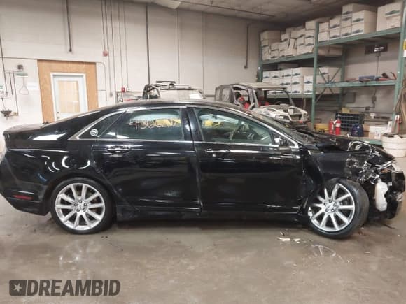 ✅ 2016 Lincoln MKZ • VIN: 3LN6L2J96GR622019 • Lot: 41366202. Listed on IAAI with 149,144 mi. Free auction sales archive from the USA and detailed vehicle history report at DreamBid. Image 13.