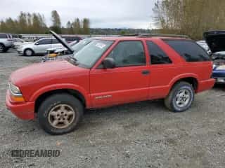 2000 Chevrolet Blazer LS z VIN 1GNCT18W5YK210040, wystawiony jako Copart lot #73253404 z przebiegiem Nie podano mil oraz Czysty tytuł • Clean title. Historia ofert i sprzedaży dostępna na DreamBid. Obrazek 1.