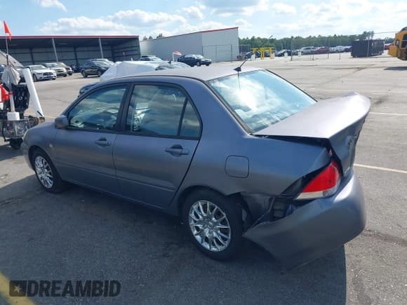 ✅ 2006 Mitsubishi Lancer ES • VIN: JA3AJ26EX6U021793 • Lot: 43094711. Listed on IAAI with 136,744 mi. Free auction sales archive from the USA and detailed vehicle history report at DreamBid. Image 3.