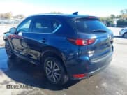 ✅ 2018 Mazda CX-5 Touring • VIN: JM3KFBCM4J0351052 • Lot: 43574119. Wystawiony na IAAI z przebiegiem 118 096 mil. Bezpłatny archiwum sprzedaży aukcyjnych z USA i szczegółowy raport historii pojazdu na DreamBid. Zdjęcie 3.
