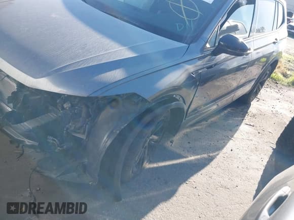 ✅ 2023 Volkswagen Tiguan SE R-Line Black • VIN: 3VVCB7AX7PM122004 • Лот: 43344585. Опубликован ранее на IAAI с пробегом 22 325 миль. Бесплатный доступ к архиву аукционных продаж из США и подробный отчёт об истории автомобиля на DreamBid. Изображение 2.