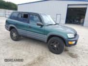 ✅ 1998 Toyota RAV4 • VIN: JT3HP10VXW7081514 • Lot: 69084205. Listed on Copart with 307,330 mi. Free auction sales archive from the USA and detailed vehicle history report at DreamBid. Image 4.