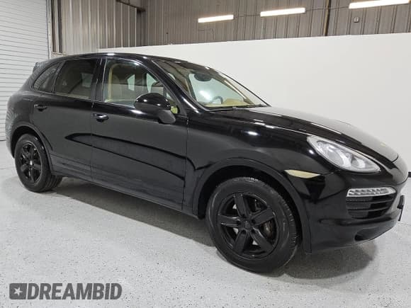 ✅ 2014 Porsche Cayenne • VIN: WP1AA2A21ELA96819 • Lot: 57865565. Listed on Copart with 135,181 mi. Free auction sales archive from the USA and detailed vehicle history report at DreamBid. Image 4.