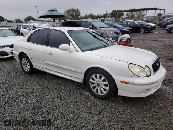 2004 Hyundai Sonata GLS с VIN KMHWF35H54A978952, выставлен на аукционе Copart как лот 49312725 с пробегом Не указан миль и Списание • Salvage title. История ставок и продаж доступна на DreamBid. Изображение 4.