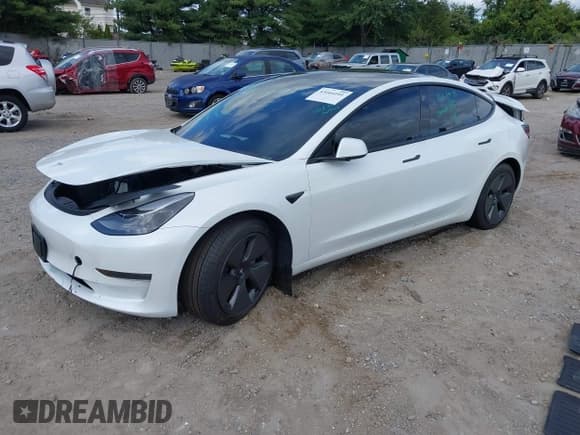 ✅ 2021 Tesla Model 3 Standard Range Plus • VIN: 5YJ3E1EA6MF052276 • Lot: 43164101. Listed on IAAI with 26,101 mi. Free auction sales archive from the USA and detailed vehicle history report at DreamBid. Image 17.