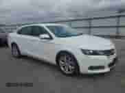 2016 Chevrolet Impala LT z VIN 2G1115S31G9129671, wystawiony jako Copart lot #86301945 z przebiegiem 212 324 mil mil oraz Szkoda całkowita • Salvage title. Historia ofert i sprzedaży dostępna na DreamBid. Obrazek 4.