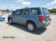 ✅ 2011 Mazda Tribute Sport • VIN: 4F2CY0C77BKM06461 • Lot: 69253675. Listed on Copart with 174,819 mi. Free auction sales archive from the USA and detailed vehicle history report at DreamBid. Image 2.