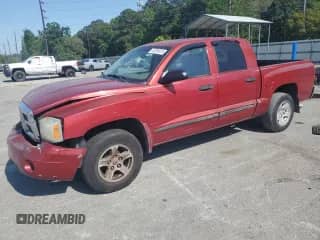 2006 Dodge Dakota SLT z VIN 1D7HE48N16S575464, wystawiony jako Copart lot #65979685 z przebiegiem 156 658 mil mil oraz Nie do naprawy • Non repairable. Historia ofert i sprzedaży dostępna na DreamBid. Obrazek 1.