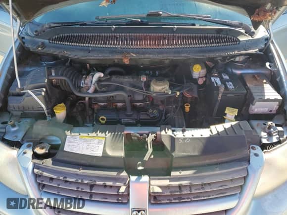 2005 Dodge Caravan SXT с VIN 2D4GP44L95R515634, выставлен на аукционе Copart как лот 74248204 с пробегом Не указан миль и Списание • Salvage title. История ставок и продаж доступна на DreamBid. Изображение 12.