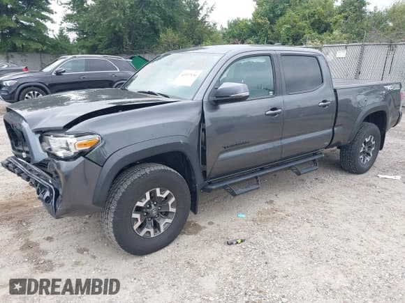✅ 2021 Toyota Tacoma SR5 • VIN: 3TMDZ5BN2MM100889 • Лот: 43157936. Опубликован ранее на IAAI с пробегом 36 630 миль. Бесплатный доступ к архиву аукционных продаж из США и подробный отчёт об истории автомобиля на DreamBid. Изображение 2.