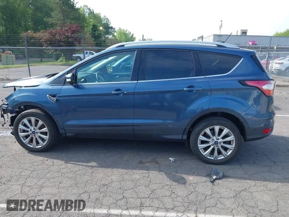 ✅ 2018 Ford Escape Titanium • VIN: 1FMCU9J92JUB01162 • Lot: 42495112. Listed on IAAI with 96,280 mi. Free auction sales archive from the USA and detailed vehicle history report at DreamBid. Image 15.