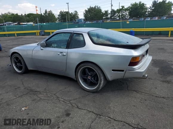 ✅ 1986 Porsche 944 • VIN: WP0AA0959GN151528 • Лот: 61916735. Опубликован ранее на Copart с пробегом 142 459 миль. Бесплатный доступ к архиву аукционных продаж из США и подробный отчёт об истории автомобиля на DreamBid. Изображение 2.