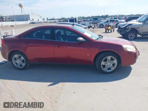 ✅ 2009 Pontiac G6 1SA • VIN: 1G2ZG57B694197323 • Лот: 43269948. Опубликован ранее на IAAI с пробегом 163 999 миль. Бесплатный доступ к архиву аукционных продаж из США и подробный отчёт об истории автомобиля на DreamBid. Изображение 14.