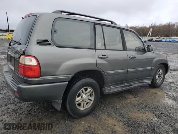 ✅ 2002 Lexus LX 470 • VIN: JTJHT00W023523130 • Лот: 90780255. Опубликован ранее на Copart с пробегом 186 676 миль. Бесплатный доступ к архиву аукционных продаж из США и подробный отчёт об истории автомобиля на DreamBid. Изображение 3.