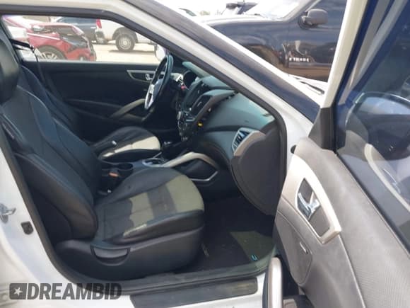 ✅ 2014 Hyundai Veloster • VIN: KMHTC6AD1EU217707 • Lot: 41718176. Wystawiony na IAAI z przebiegiem 191 306 mil. Bezpłatny archiwum sprzedaży aukcyjnych z USA i szczegółowy raport historii pojazdu na DreamBid. Zdjęcie 5.