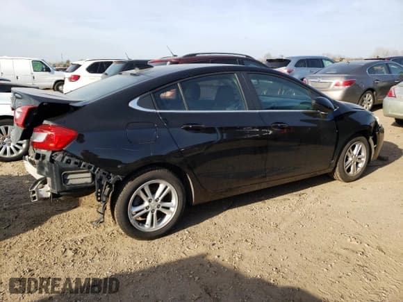 ✅ 2018 Chevrolet Cruze LT • VIN: 1G1BE5SM4J7100658 • Lot: 47923453. Listed on Copart with 48,161 mi. Free auction sales archive from the USA and detailed vehicle history report at DreamBid. Image 3.